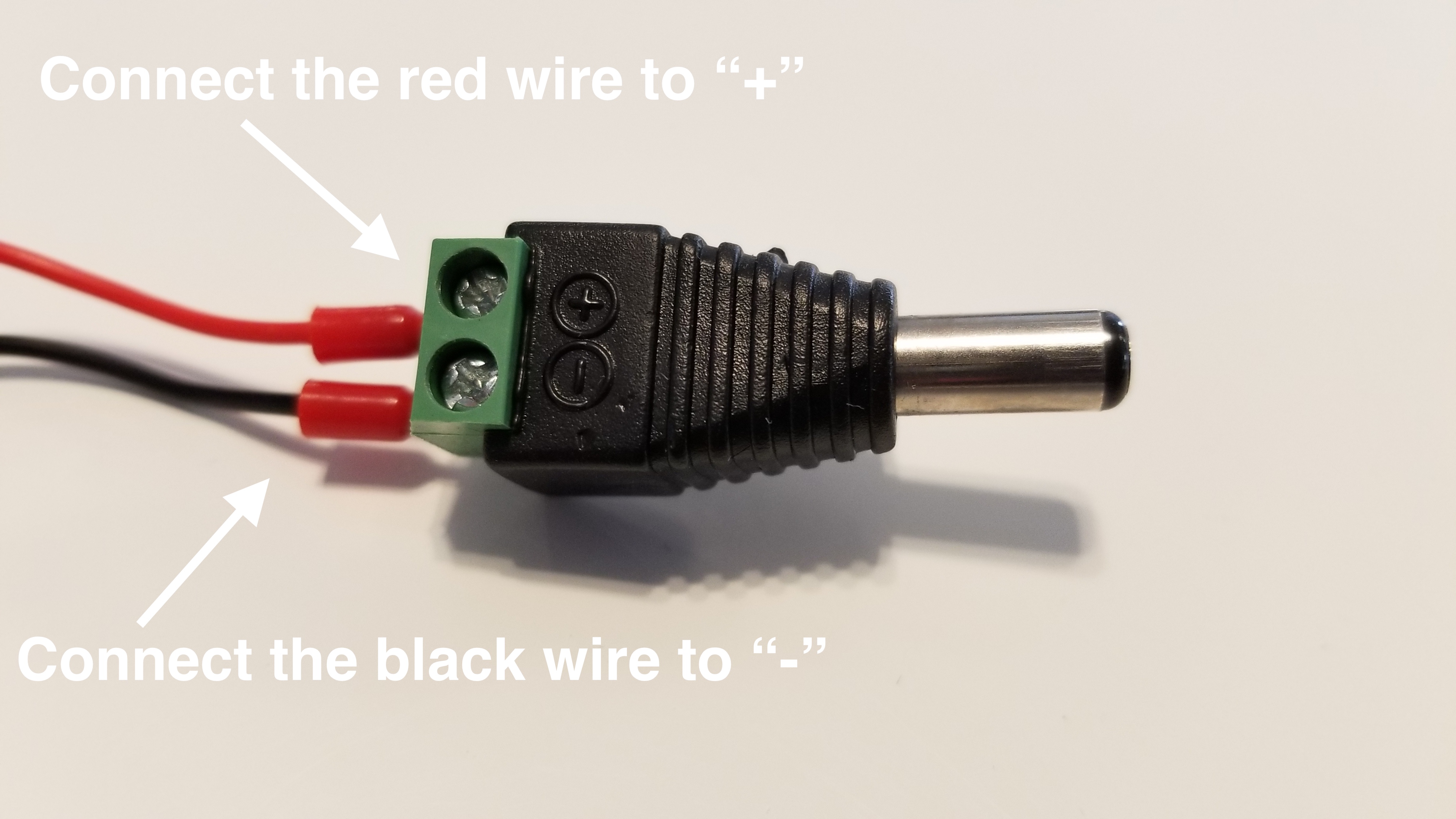 connect the male clip on connector and the camera power cables